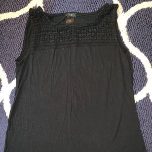 Cute black tank with crocheting details!